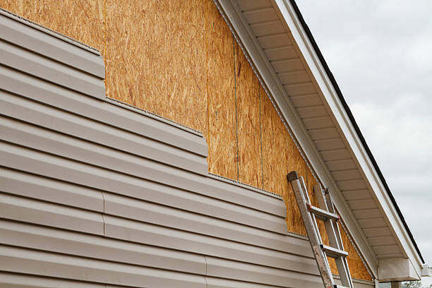 Professional Siding Installation technician working in Shamokin Dam, PA